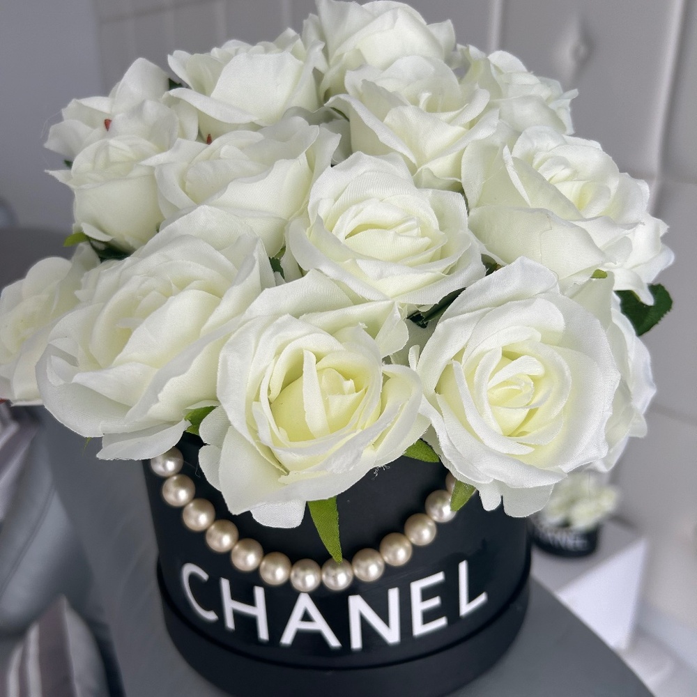White silk roses in black box with white letters and pearls